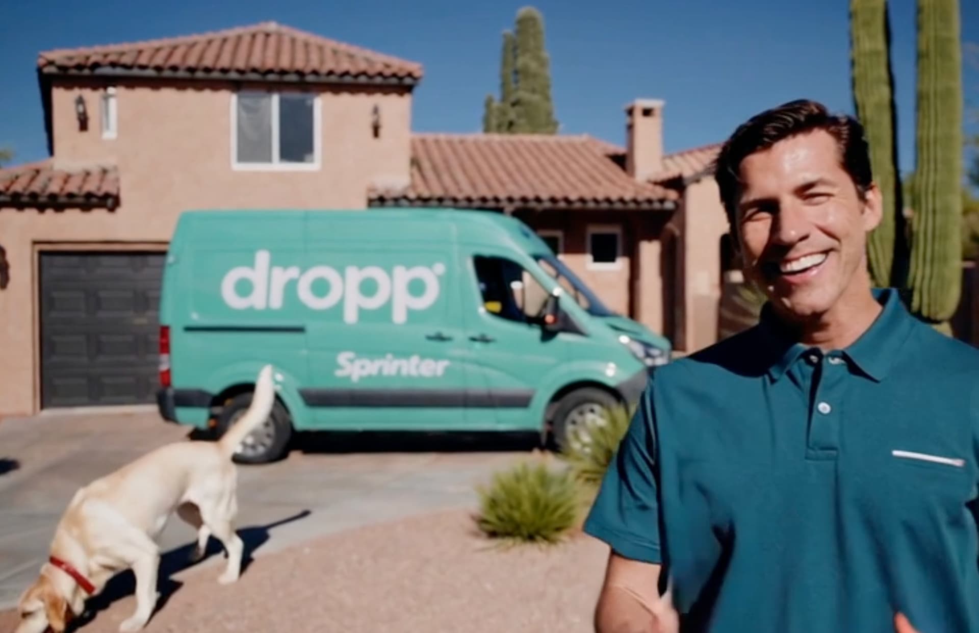 DROPP Service Van with friendly dog and smiling professional